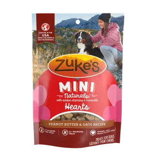 Front of a package of Zukes Mini Naturals heart shaped dog training treats, peanut butter and oats recipe