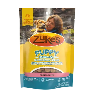 Front of a package of Zukes Puppy Naturals puppy training treats, pork recipe
